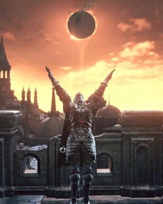A Dark Souls III screenshot — the player character on a castle rampart, arms raised, under a solar eclipse.